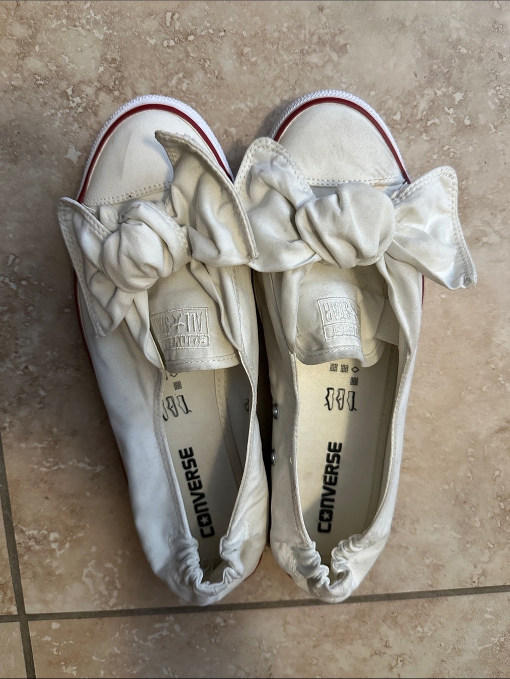 Converse Women’s White Slip-On Sneakers with Red Trim and Bow